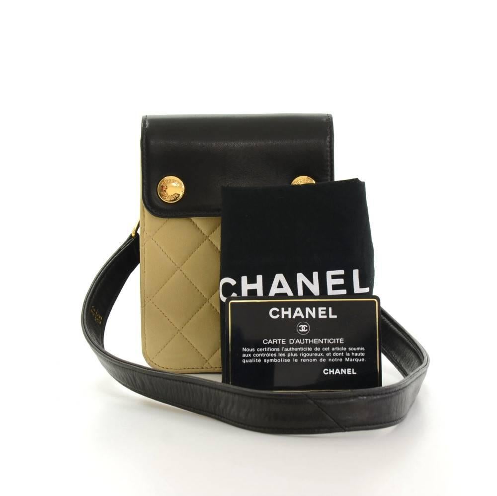 Chanel black x beige quilted leather 2way bag. It has 2 CC stud lock on the front. Inside has black leather lining. Comfortably carry as shoulder or waist bag. Very practical and great companion where you goBelt size: Total length app 26.8 inch or
