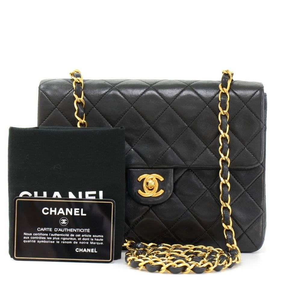 Chanel black quilted leather mini bag. It has flap and CC twist lock on the front. Inside has Chanel red leather lining and 2 pockets; 1 zipper and 1 open slit into 3 compartment. It can be used as shoulder bag or across the body.

Made in: