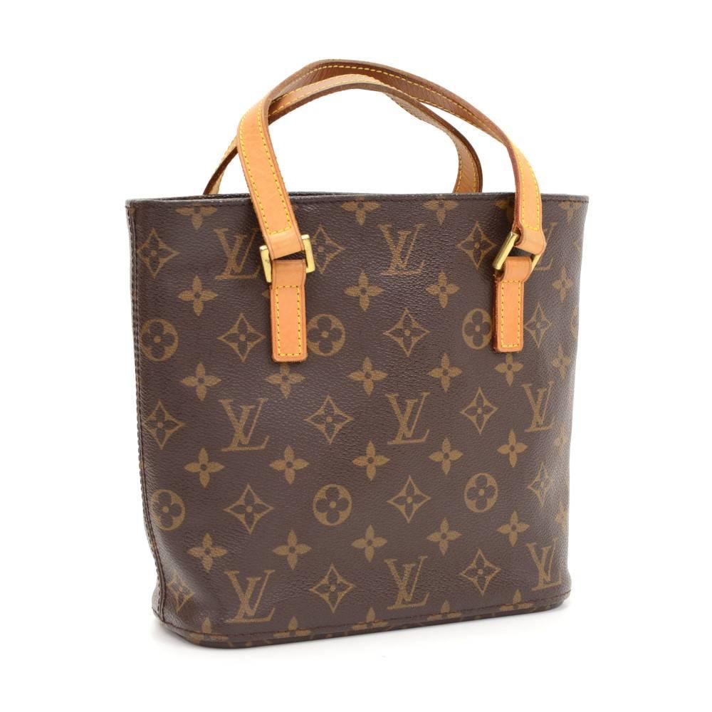 Louis Vuitton Vavin PM in monogram canvas hand bag. Inside has brown washable lining 1 zipper pocket, 2 large and 2 small open side pockets. Great for your daily use.

Made in: France
Serial Number: SR1021
Size: 8.3 x 8.3 x 3.3 inches or 21 x 21