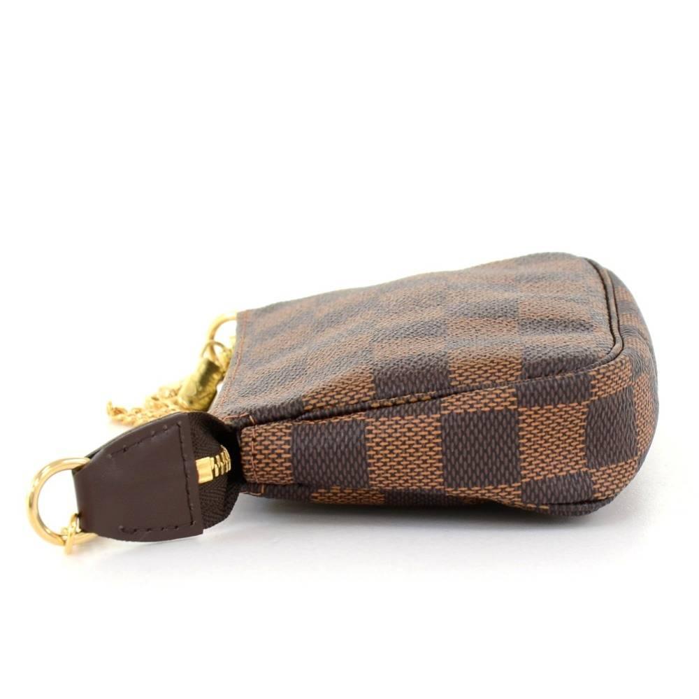 Women's Louis Vuitton Mini Pochette Accessories Ebene Damier Canvas Pouch Bag