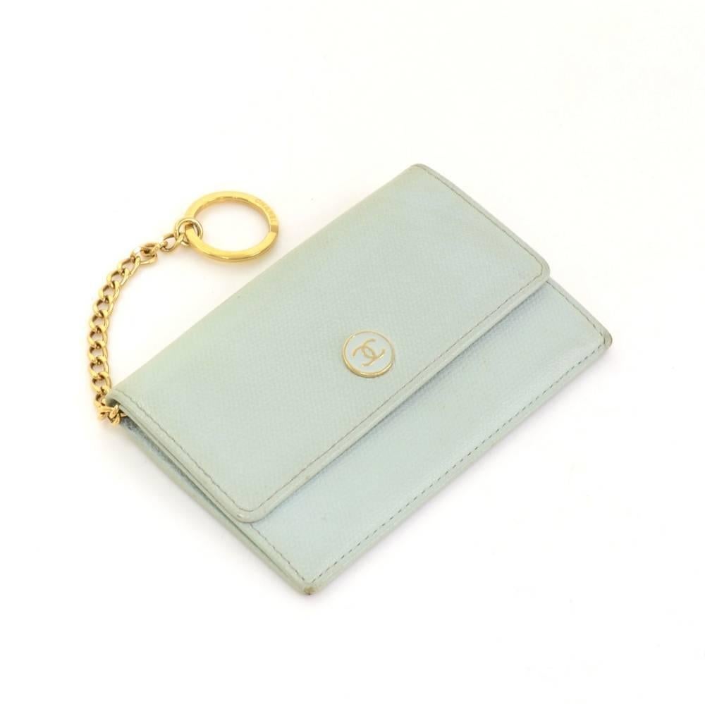 Chanel cyan caviar leather card case. It has CC logo on front and card slot and coin case. Very practical where you go!

Made in: France
Serial Number: 9844822
Size: 4.7 x 3.1 x 0 inches or 12 x 8 x 0 cm
Dust bag:   Not included  
Box:   Not