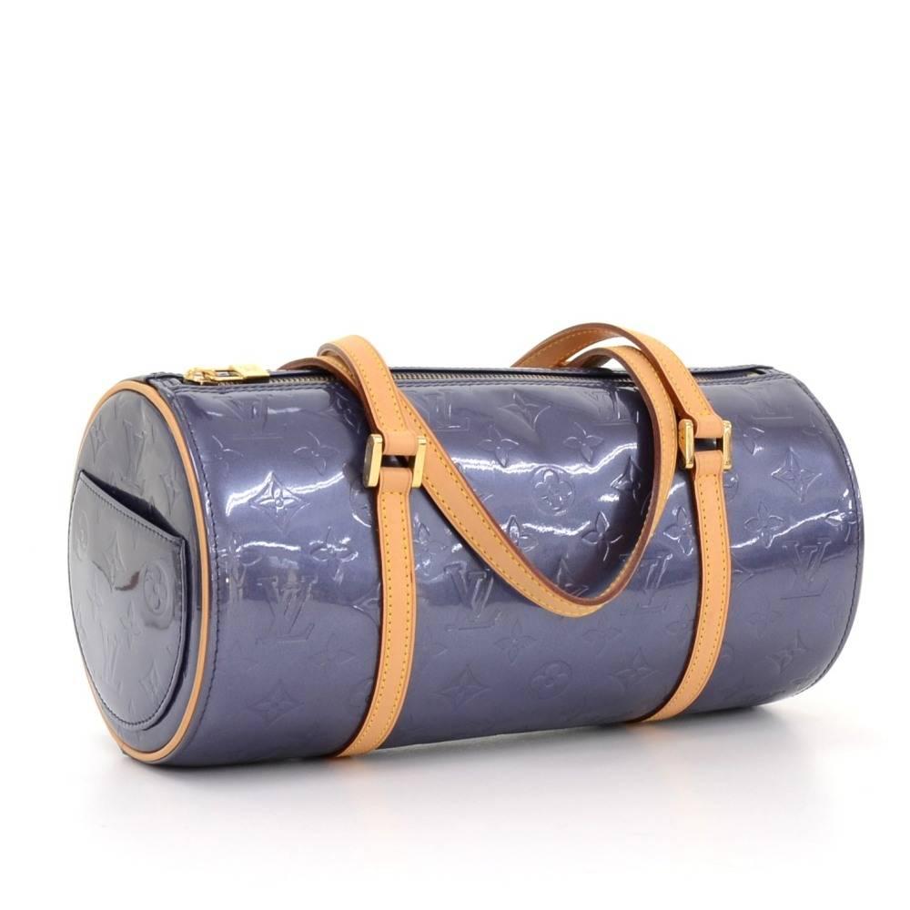 Louis Vuitton Bedford handbag in vernis leather. Simple and easy access is secured with gold zipper. Inside has enough space for all your necessities. This model is long discontinued model. Perfect for night out, parties or any occasion where you