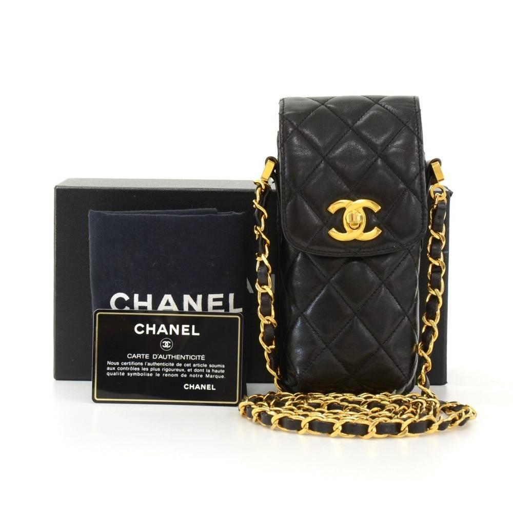 Chanel black quilted leather case/pouch to carry phone, cigarettes or small digital cameras. Inside has leather lining. Chain intertwined with leather. Can be worn accross as well on one shoulder. Collectors item! 

Made in: Italy
Serial Number: