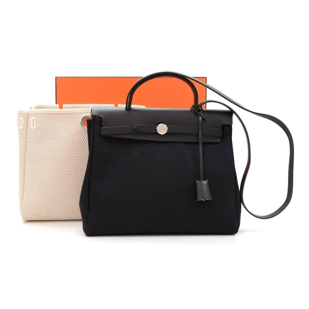 Hermes HerBag PM size 2 in 1. Two canvas bags with leather. Leather pieces can be attached to both bags so you can enjoy different looks. Shoulder strap is removable. Very stylish bag.  Small Canvas bag: App 11.8 x 9.1 x 4.7 inches or 30 x 23 x 12