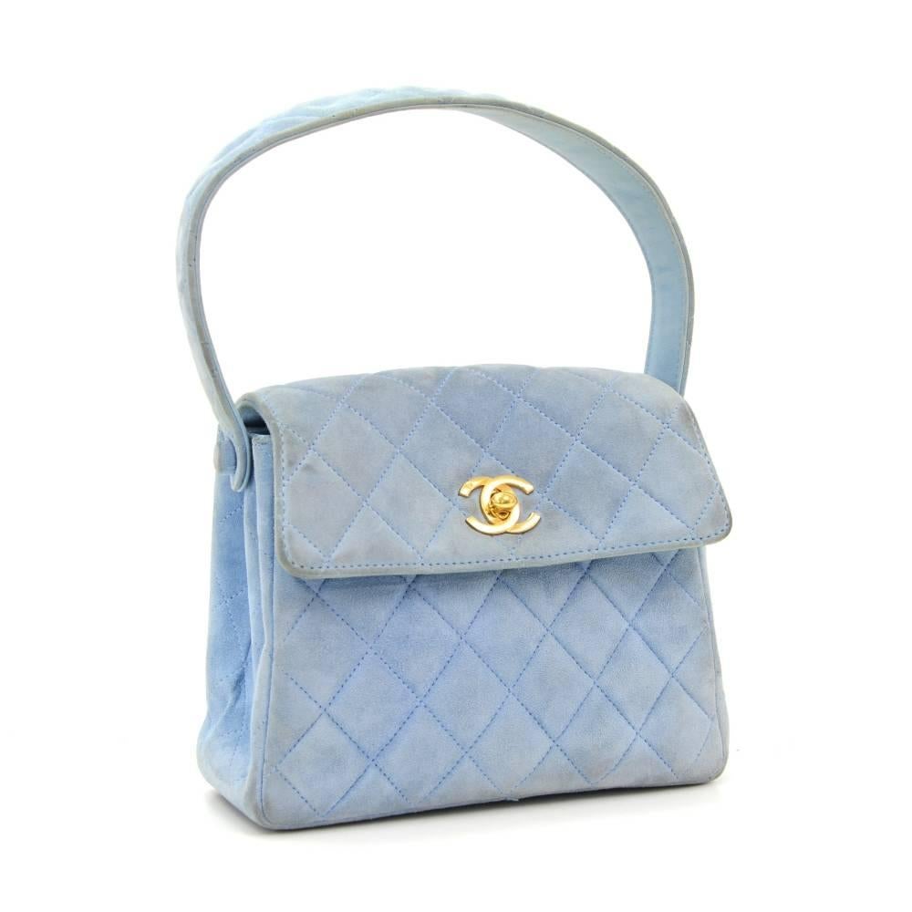 Chanel bag in light blue quilted suede leather. Flap top with CC logo twist closure and 1 open pocket on back. Inside has llambskin eather lining with 2 compartment and 1 open pocket. Wonderful statement bag wherever you go!

Made in: