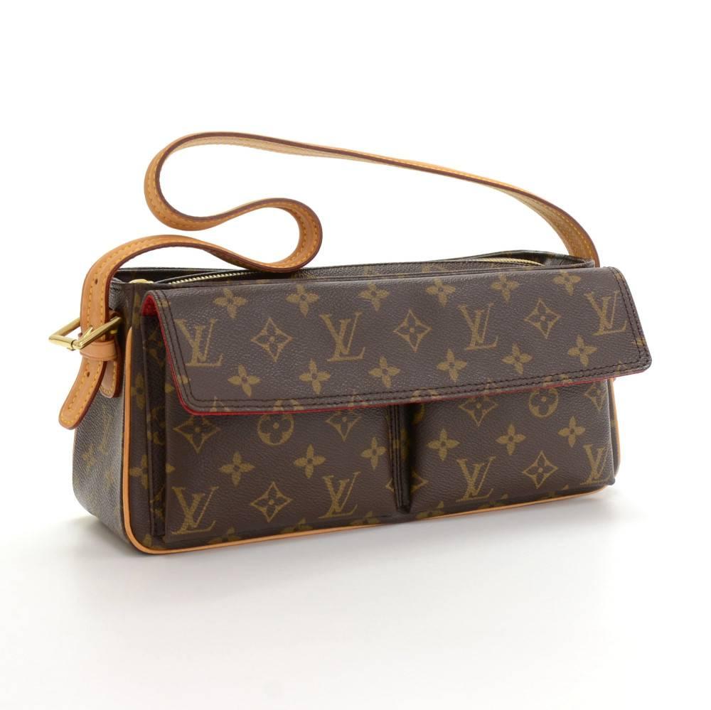 Louis Vuitton Viva Cite bag in monogram canvas. Outside has 2 flap pocket with magnetic closures. Main access is secured with zipper. Inside has red alkantra lining and 2 open pockets. Adjustable cowhide strap.

Made in: France
Serial Number: A R