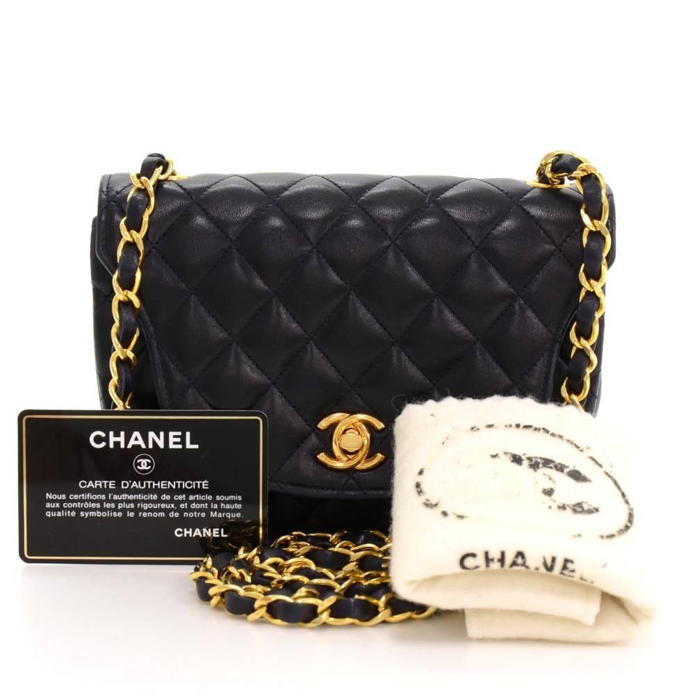 Chanel quilted mini shoulder bag in navy leather. It has a flap top with CC twist lock on the front. Inside has Chanel navy leather lining and 1 pocket with zipper. Comfortably carried on shoulder with single chain.  

Made in: France
Serial