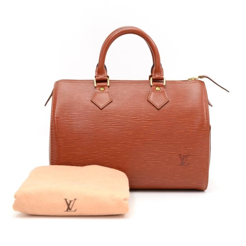 Louis Vuitton epi leather speedy 25 hand bag. Inspired by the famous keep all travel bag, it has zip closure. This bag in Epi leather is perfect for carrying everyday essentials. One of the most popular shapes from Louis Vuitton.

Made in: