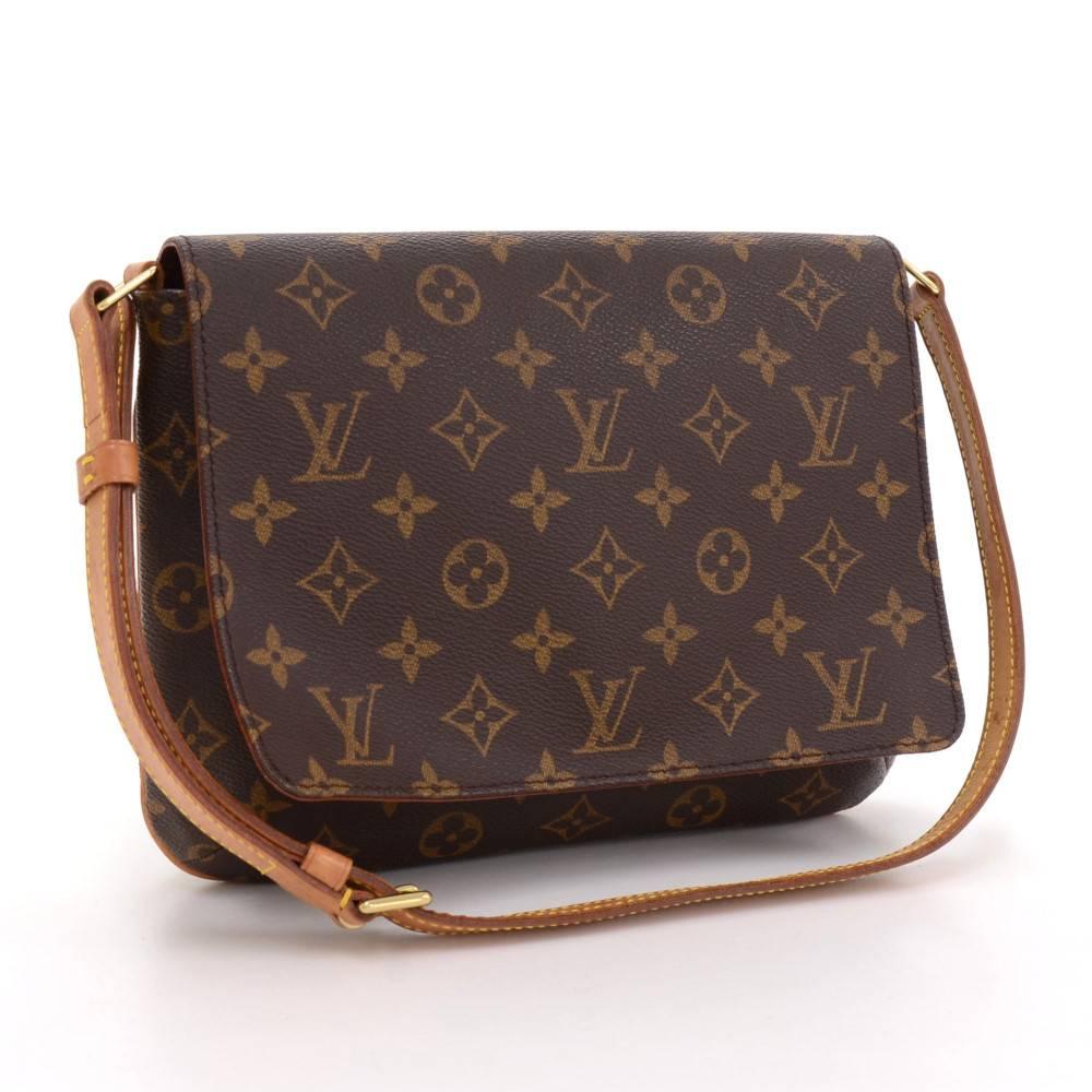 Louis Vuitton Musette Tango shoulder bag in monogram canvas. Magnetic flap closure, inside is in brown alkantra lining and has one open side pocket. Adjustable leather strap could be worn on the shoulder. 

Made in: France
Serial Number:
