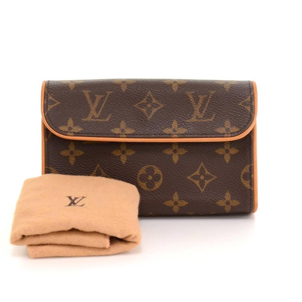 Louis Vuitton Florentine Pochette in monogram canvas. With its magnetic closure flap, the Florentine pouch is as practical as it is elegant. It can also be worn around the waist on the natural cowhide leather snap fastener belt.  It comes with