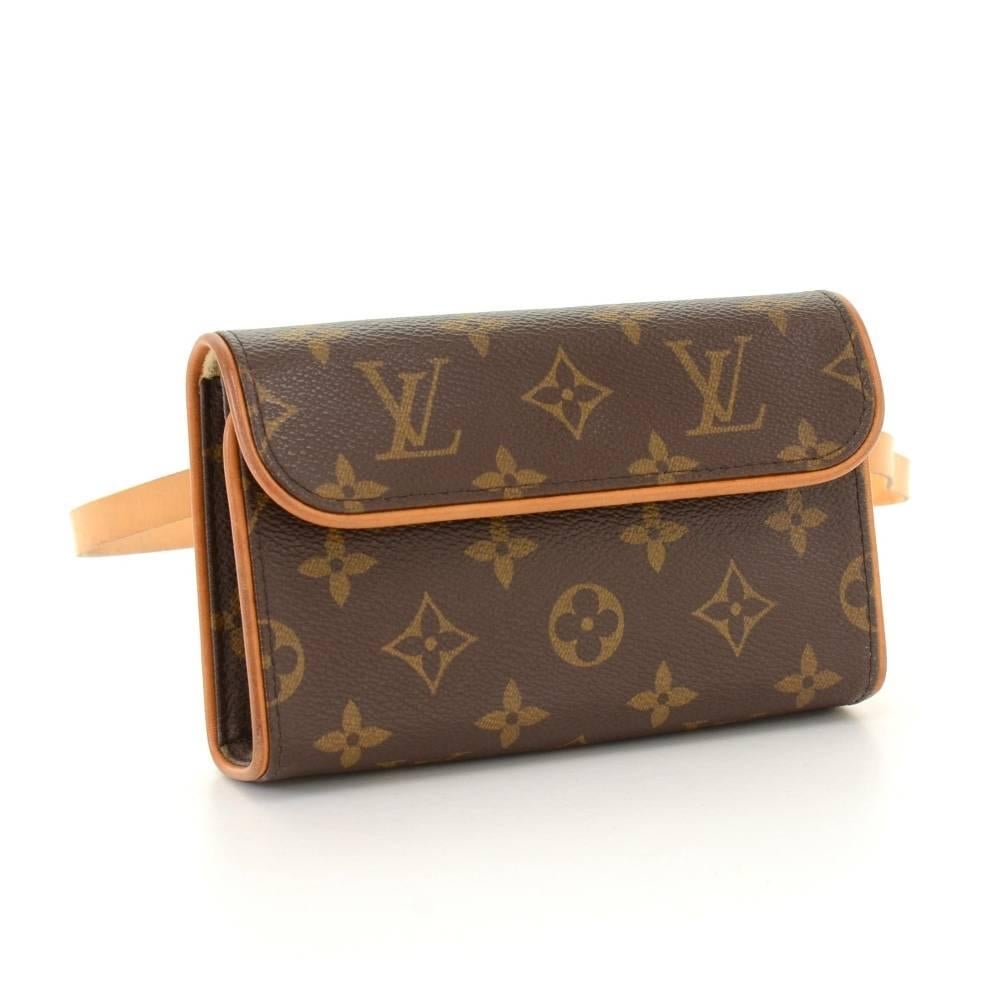 Louis Vuitton Florentine Pochette in monogram canvas. With its magnetic closure flap, the Florentine pouch is as practical as it is elegant. It can also be worn around the waist on the natural cowhide leather snap fastener belt.  It comes with