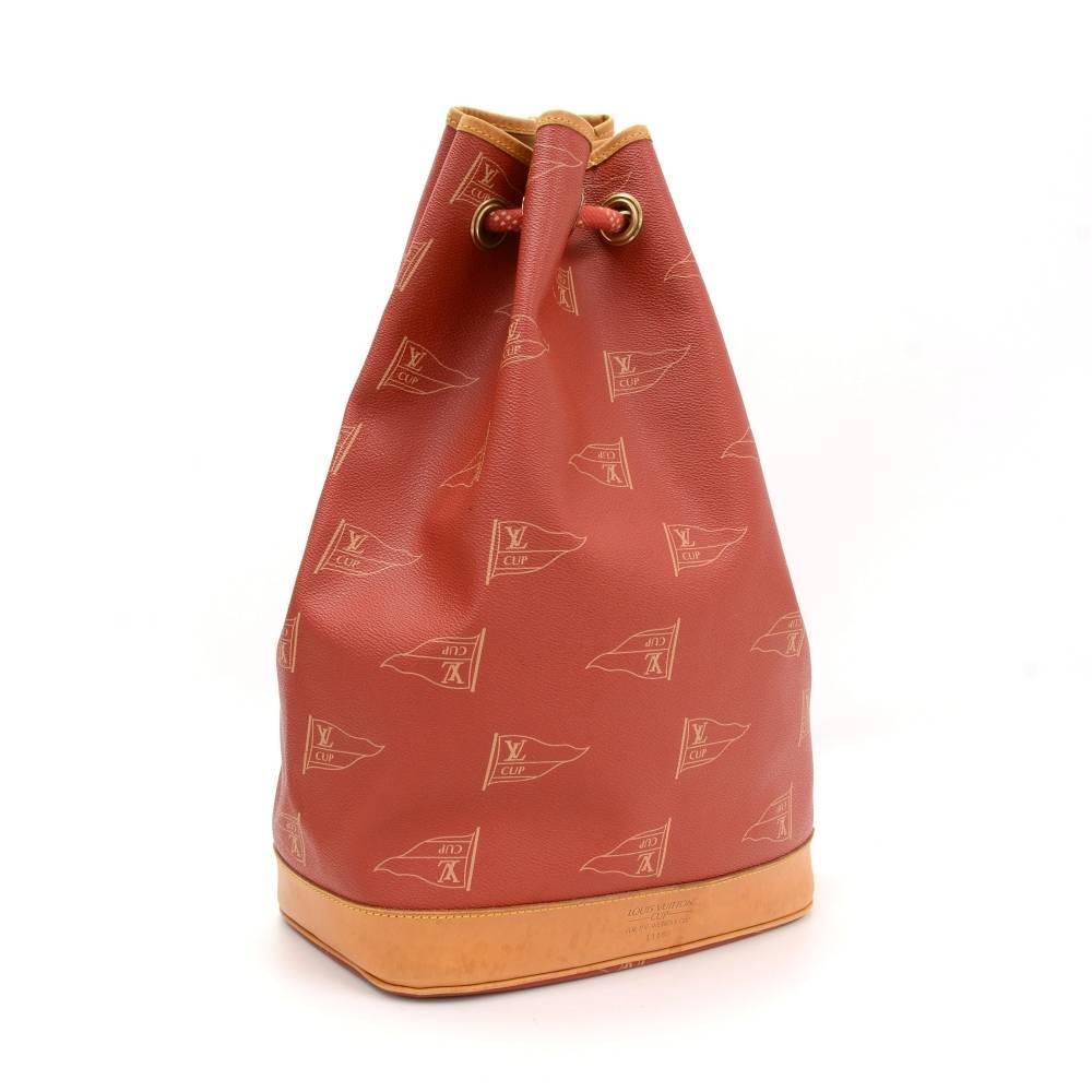 Louis Vuitton limited edition tote bag from the 1995 LV Cup edition. Main access secured with strings. Inside has 1 zipper pocket. A very rare limited bag! Limited item number No. 1116.

Made in: France
Serial Number: S P 0 9 7 4
Size: 10.6 x
