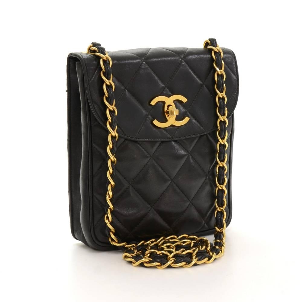 Chanel black quilted leather mini bag. It has flap and CC twist lock on the front and open slip in pocket on the back. Inside has black leather lining and 2 zipper pockets. It can be used as shoulder bag or across the body.

Made in: Italy
Serial