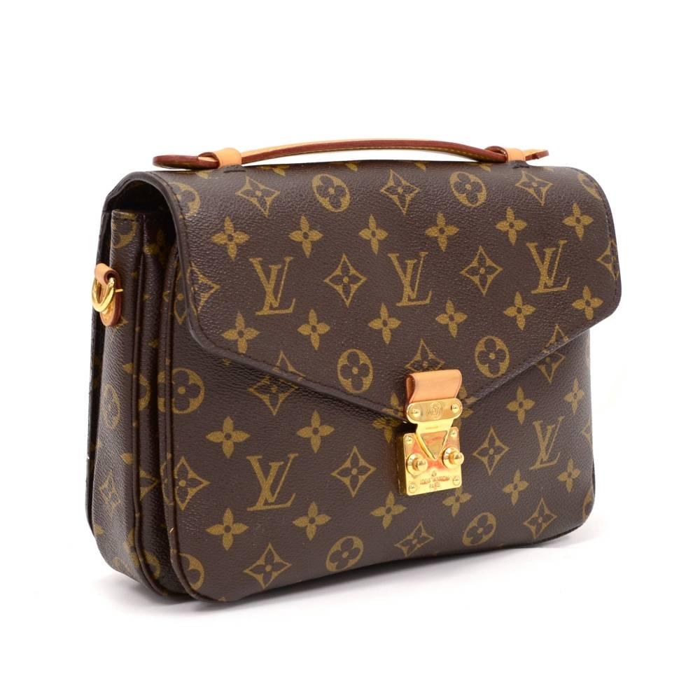 Louis Vuitton Pochette Metis hand bag. Flap top with push closure and one zipper pocket on the back. Inside is in dark brown alkantra lining with 2 compartments and 2 open pockets. Comfortably carry in hand.

Made in: France
Serial Number: D R 0