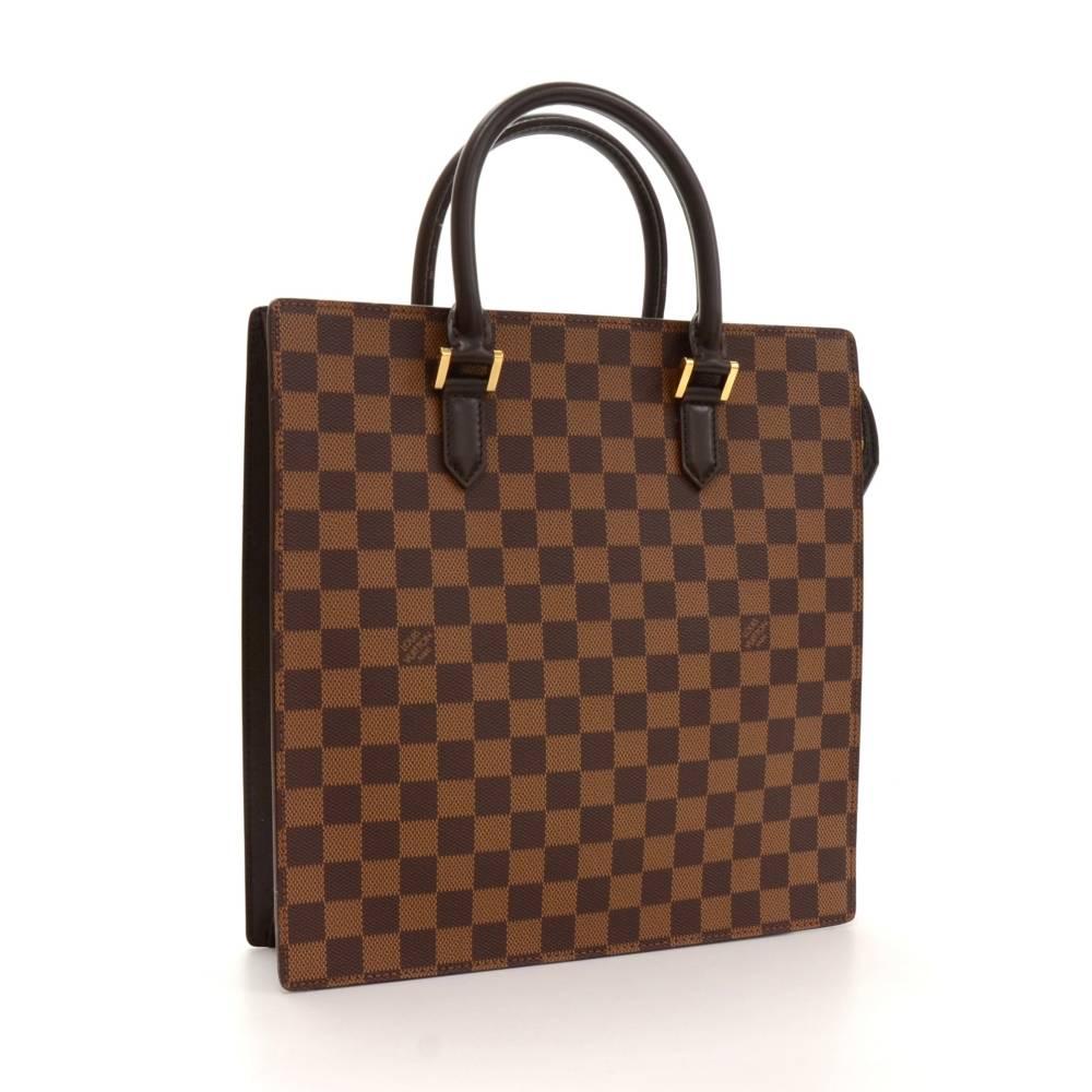 Louis Vuitton Venice tote bag in Damier canvas. Top secured with zipper. Inside has alkantra lining and 1 zipper pocket. Hand-held with its comfortable leather handles, is generously dimensioned to carry all your daily necessities. 

Made in: