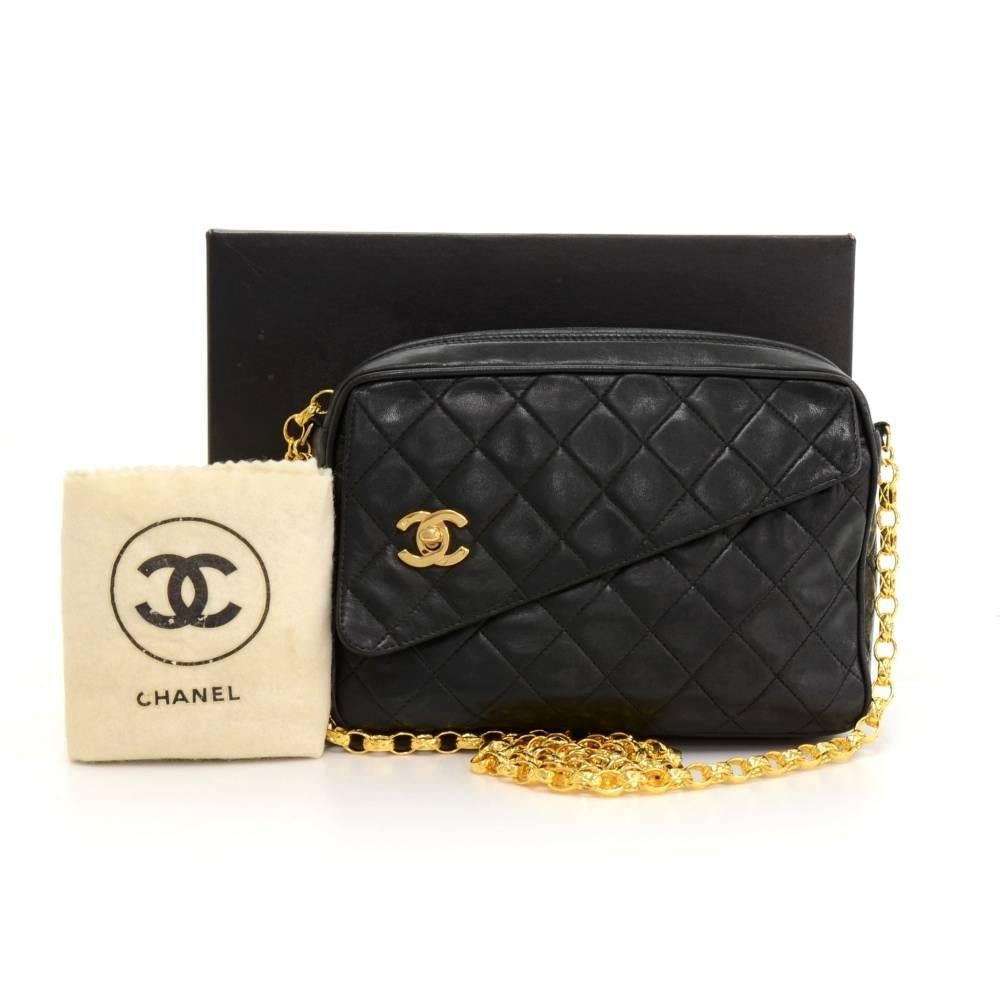 Chanel shoulder pochette/bag in black quilted leather. It has 1 pocket with flap and CC twist lock on front. Top has zipper closure and fringe is attached as zipper pull. Inside has 1 zipper and 1 open pocket. Comfortably carried on
