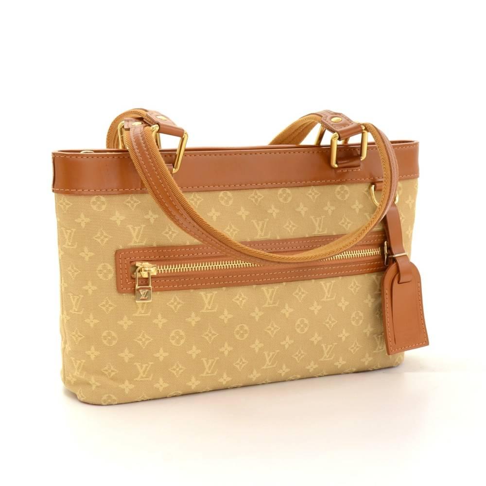 Louis Vuitton Lucille bag in mini monogram canvas. Outside has 1 zipper pocket. Top is secured with zipper. Inside has fabric lining and 2 open pockets: 1 for mobile. Beautiful bag perfect for shopping, night out or a date.

Made in: