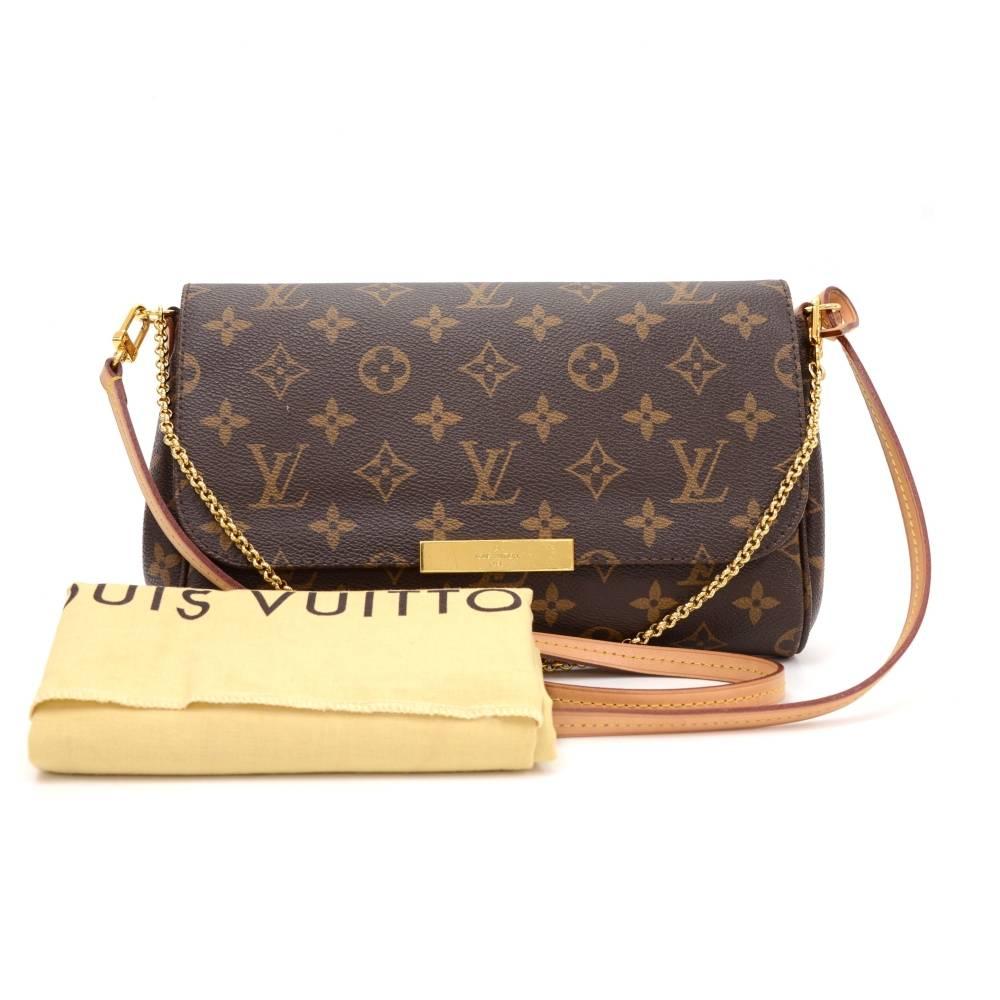 Louis Vuitton Pochette Favorite PM 2way bag in monogram canvas. Flap top secured with push magnetic closure. Inside is in dark purple canvas lining with 1 open pocket. Can be used as shoulder, hand bag or clutch. Great for night out. 

Made in: