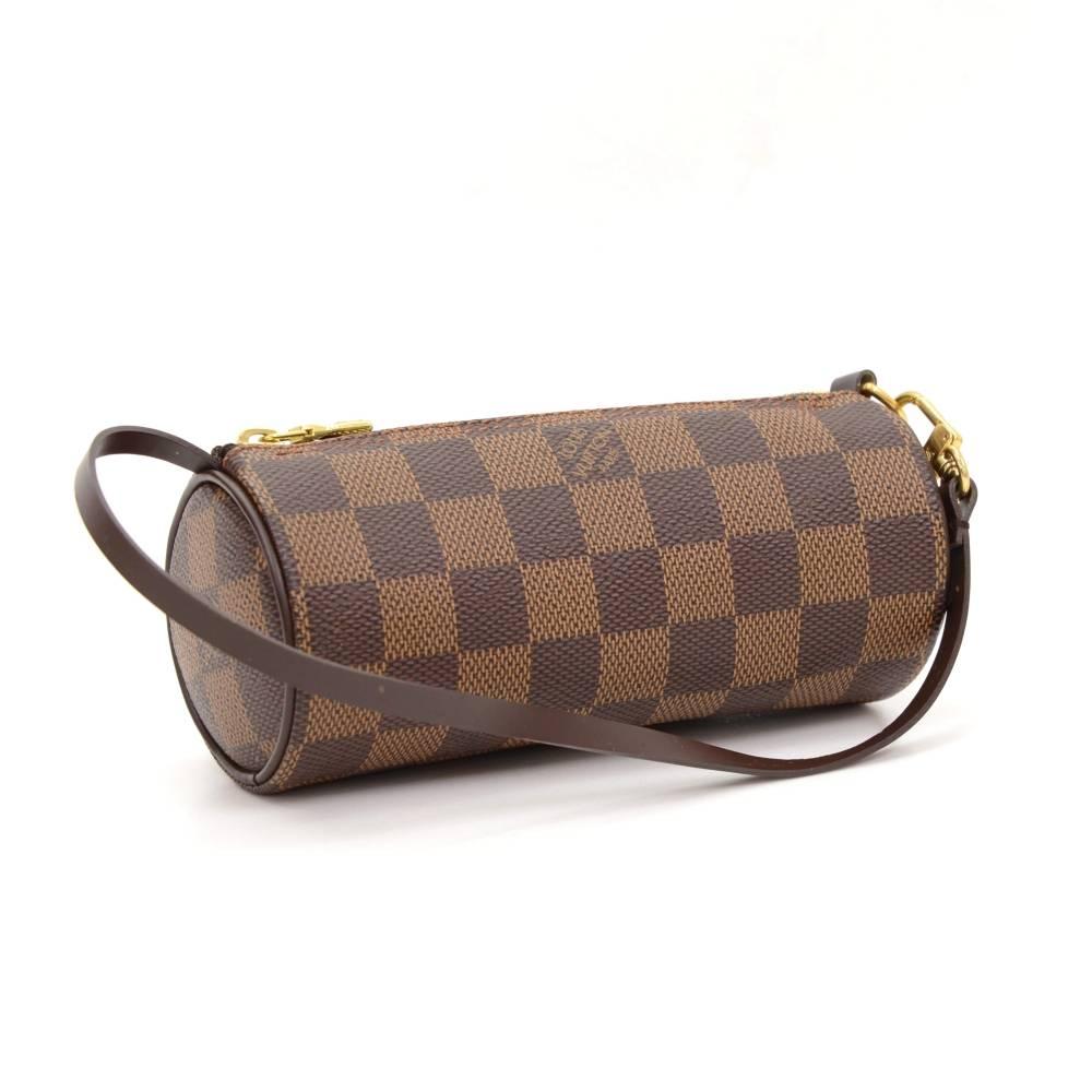 Louis Vuitton Pochette Papillon in damier canvas. Perfect for night out and parties. It can be either hand-held or linked to the D-ring found in many Louis Vuitton bags.

Made in: France
Size: 6.1 x 2.6 x 2.6 inches or 15.5 x 6.5 x 6.5 cm
Color: