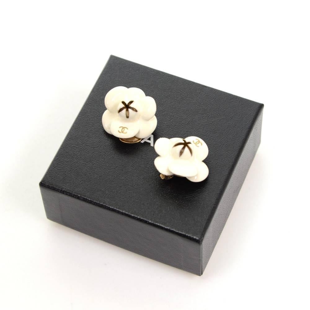 Chanel white enamel camellia earrings. CHANEL 02 CC P Made in France engraved on the back. They look truly wonderful and have easy and secure system to put them on!

Made in: France
Size: 1 x 1 x 0 inches or 2.5 x 2.5 x 0 cm
Color: White
Dust