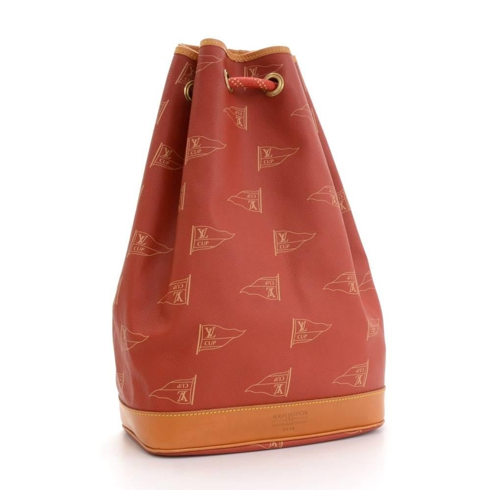Louis Vuitton limited edition tote bag from the 1995 LV Cup edition. Main access secured with strings. Inside has 1 zipper pocket. A very rare limited bag! Limited item number No. 0338.

Made in: France
Serial Number: S P 0 9 7 4
Size: 10.6 x