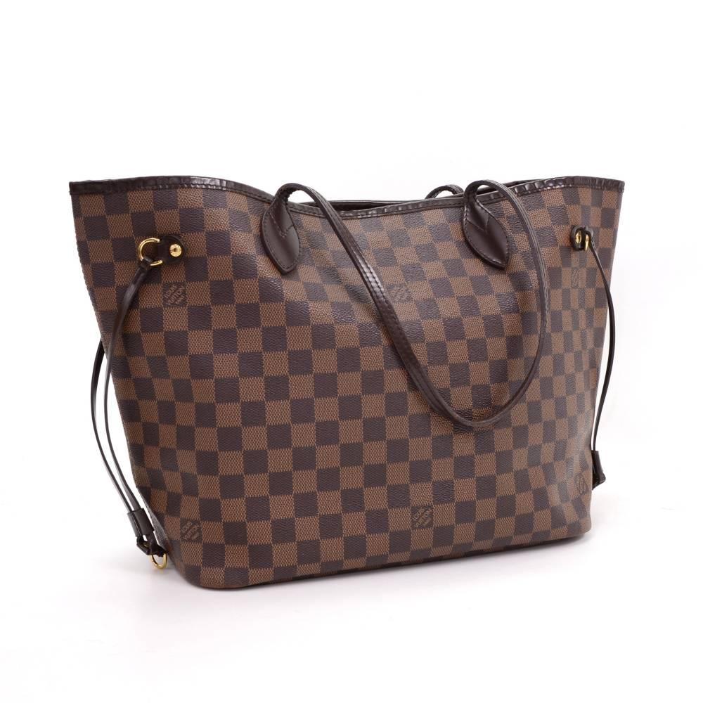 Louis Vuitton Neverfull MM tote bag. Inside has 1 zipper pocket. Comes with D ring inside to attach small pouches or keys. Perfect for daily use of night out.

Made in: Spain
Serial Number: GI 0193
Size: 12.6 x 11.4 x 6.5 inches or 32 x 29 x