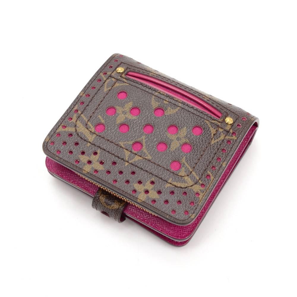 Louis Vuitton monogram canvas fuchsia perforated wallet. It has coin case with zipper closure. Main compartment has 5 slots for cards and compartment for note. This limited model is very rare to find. 

Made in: France
Serial Number: Hard to