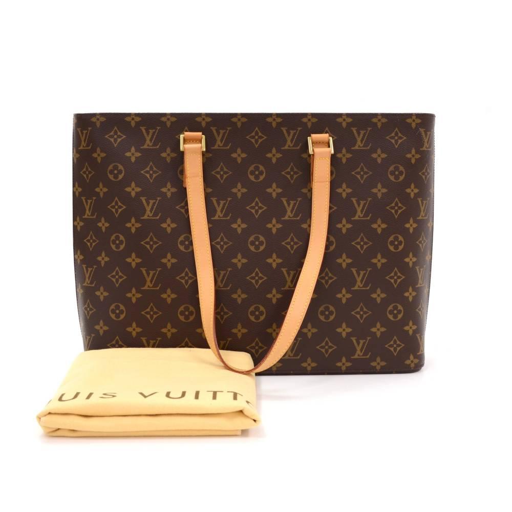 Louis Vuitton Luco large tote crafted in canvas monogram. Top is secured with brass zipper. Inside is beige alkantra with 2 open, 1 with zipper and 1 for mobile. Comfortably carried on shoulder cowhide leather strap and offers great capacity.