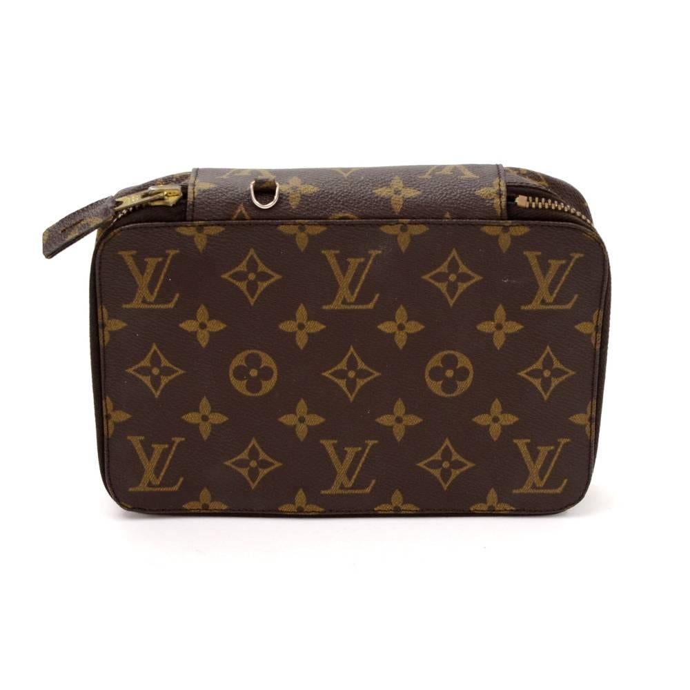 Louis Vuitton jewelry case Monte Carlo in monogram canvas. Top secured with a zipper and inside has 3 zipper pouches. Lining is luxurious soft alkantra to keep jewelry protected. Make this beauty yours today! Very rare to find!

Made in: