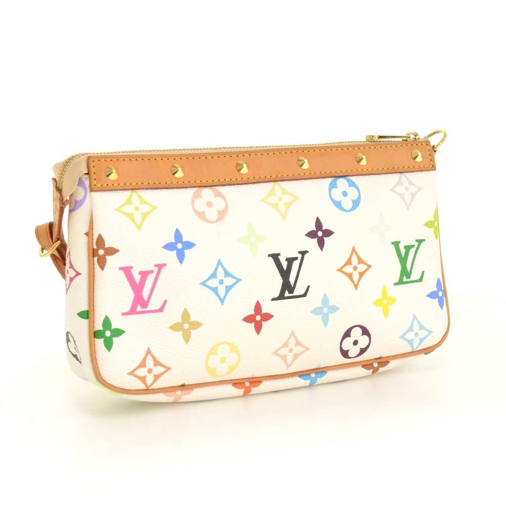 Louis Vuitton Pochette Accessories in multicolor canvas. Secured with zipper. Inside is red alkantra. Perfect for a night out and parties. It can be either hand-held or linked to the D-ring found in many Louis Vuitton.

Made in: France
Serial