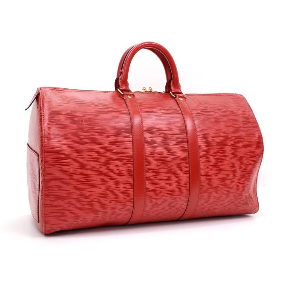 Louis Vuitton Keepall 45 in Epi leather. It is a classic of the Louis Vuitton travel bag collection. It has comfortable rounded leather handles and a double zipper. Easy access and truly popular color. 

Made in: France
Serial Number: