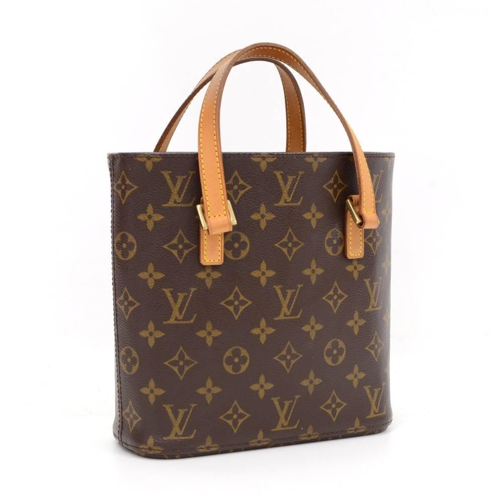 Louis Vuitton Vavin PM in monogram canvas hand bag. Inside has brown washable lining 1 zipper pocket, 2 large and 2 small open side pockets. Great for your daily use.

Made in: France
Serial Number: SR0033
Size: 8.3 x 8.3 x 3.3 inches or 21 x 21