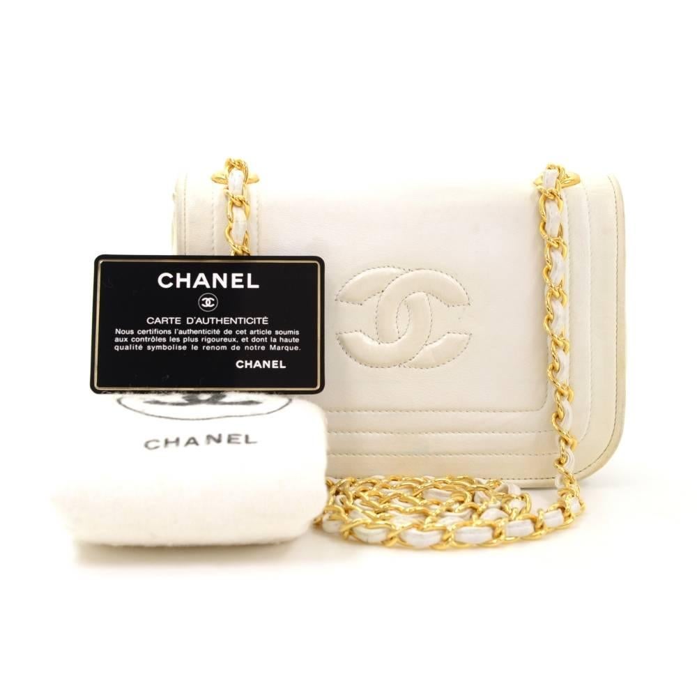 Chanel mini shoulder bag in white color. CC logo stitched on flap and secured with magnetic closure. Inside is in white lambskin lining and one zipper pocket. Carried on shoulder or across body. Trully rare collectors item! 

Made in: Italy
Serial