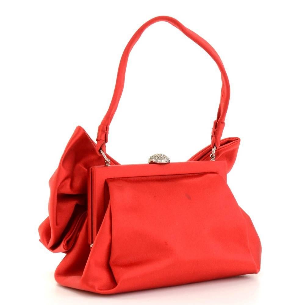 Valentino party hand bag in red stain. Top is secured with lock. Inside has beige lining. Perfect for night out. Very cute!

Made in: Italy
Serial Number: BU CXB 067 A
Size: 7.1 x 3.5 x 3.5 inches or 18 x 9 x 9 cm
Color: Red
Dust bag:   Not included