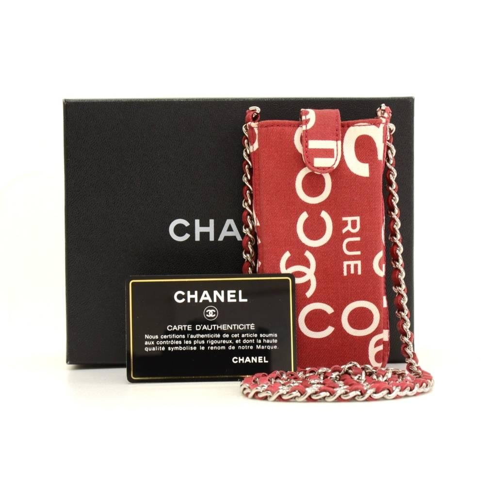 Chanel Red x White canvas mobile phone or glasses case with stud closure. Inside has white leather lining. Fits perfectly iPhone 5. Carry on shoulder or across body in style.

Made in: Italy
Serial Number: 7516673
Size: 5.1 x 2.6 x 1 inches or 13 x