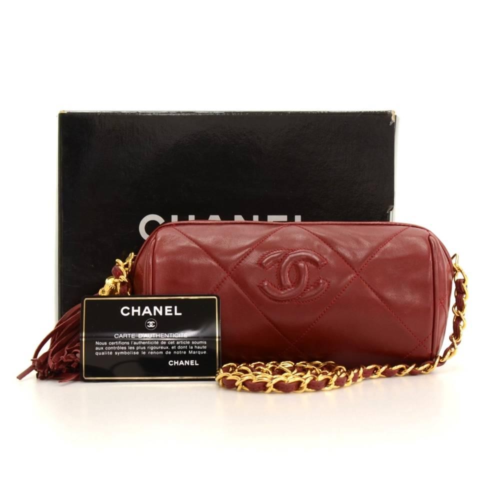 Chanel dark red quilted leather pouch bag. Simple design and easy access secured with zipper and fringe attached as zipper pull. Inside has burgundy leather lining and 1 zipper pocket. Look so cute!

Made in: Italy
Serial Number: 0749909
Size: 6.9 x