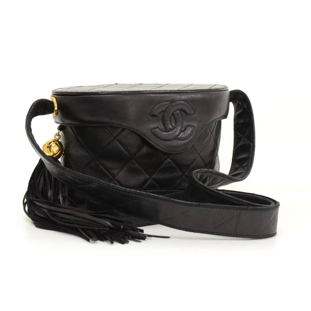 Chanel shoulder pochette/bag in black quilted leather. Top access with flap and magnetic closure and fringe is attached on flap. Inside has black leather lining with 1 zipper pocket. Comfortably carried on shoulder.

Made in: Italy
Serial Number: