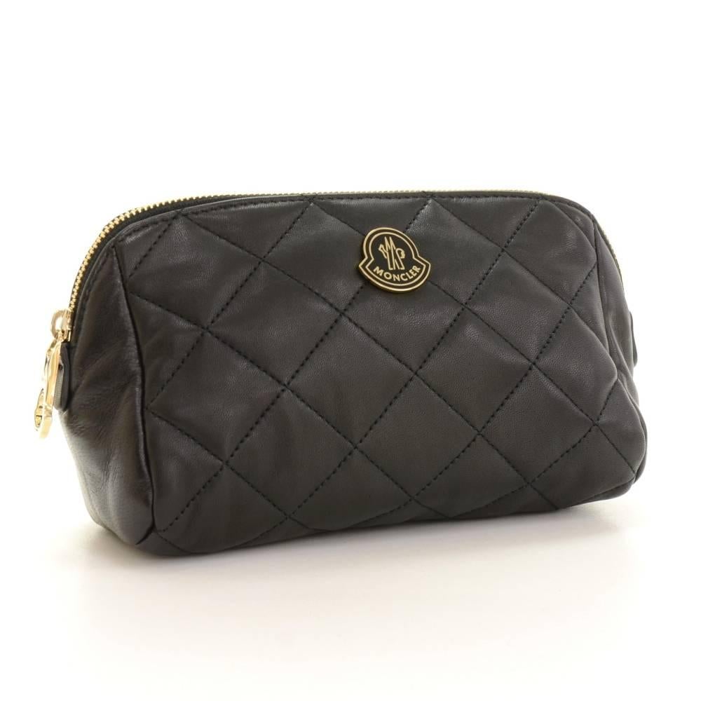 Moncler black quilted leather beauty pouch and secured with zipper. Inside has black nylon lining. Very cute item.

Made in: Italy
Serial Number: BC425696GPLB
Size: 7.9 x 5.1 x 3.1 inches or 20 x 13 x 8 cm
Color: Black
Dust bag:   Yes included 