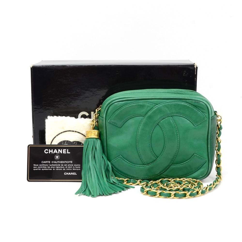 Chanel bag in green Lambskin leather. Large CC logo stitched on front and nice fringe is attached to the main zipper pull. Inside is in beige leather lining with 1 zipper pocket. Can be carried on one shoulder.  

Made in: Italy
Serial Number: