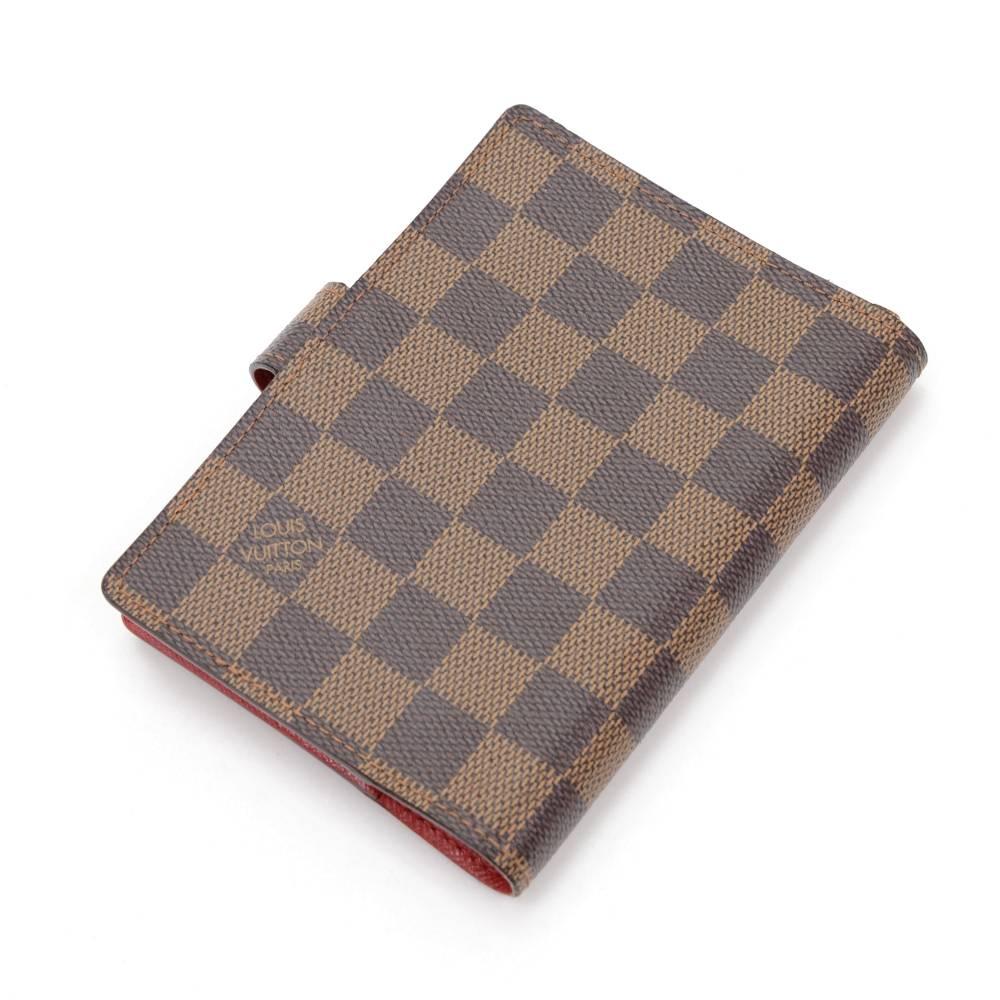 Louis Vuitton damier Agenda Fonctionnel PM agenda cover. It has red lining with 3 card slots, 2 open pocket as well 1 pen holder. 

Made in: Spain
Serial Number: CA1006
Size: 3.9 x 5.7 x x inches or 10 x 14.5 x x cm
Color: Brown
Dust bag:   Not