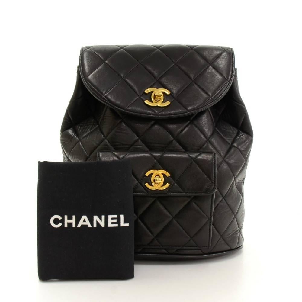 Chanel black quilted leather backpack. Flap top closure access with CC twist lock. Outside has small pocket with twist lock closure. Leather tie up string and twist lock to secure the access. Inside has leather lining. 

Made in: France
Serial