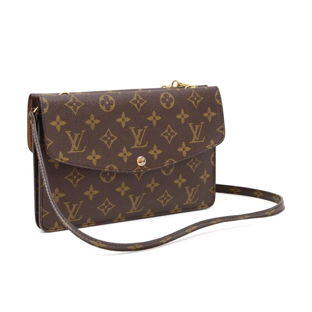 This is Louis Vuitton pochette Double Rabat clutch / shoulder bag. It has 2 separated compartments with flap and stud closure. Inside has 1 open pocket on each compartment. Can used as shoulder or clutch bag.

Made in: France
Size: 9.4 x 6.3 x 1.2