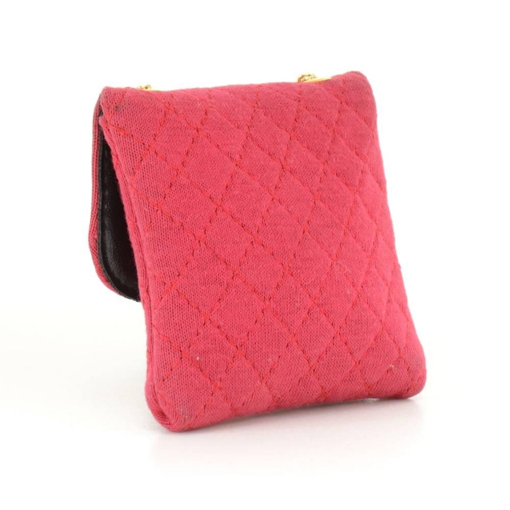 Vintage Chanel rose pink quilted cotton on outside, black lambskin on the inside coin case on chain secured by stud lock. You can keep small make up box, ticket love letter etc. Make this beauty yours today! Very rare to find!

Made in: France
Size: