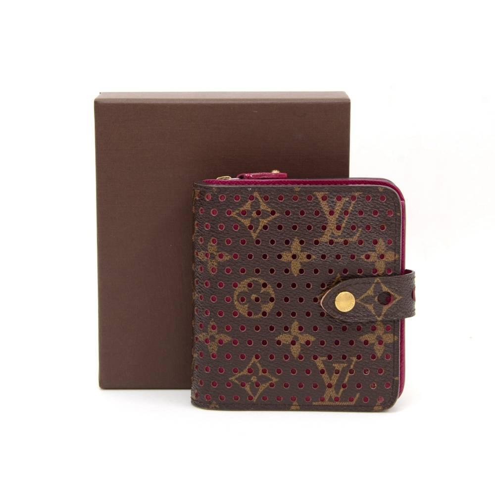 Louis Vuitton monogram canvas fuchsia perforated wallet. It has coin case with zipper closure. Main compartment has 5 slots for cards and compartment for note. This limited model is very rare to find. 

Made in: France
Serial Number: MI0026
Size: