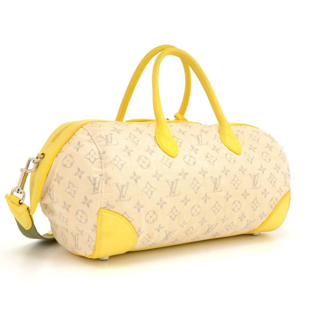 Louis Vuitton Speedy Round PM hand bag in Mini Monogram Denin x yellow leather. It is limited ediiotn from Spring - Summer 2012. Top secured with double zipper. Inside has yellow alkantra lining with 2 open pockets. Perfect for daily use. 

Made in: