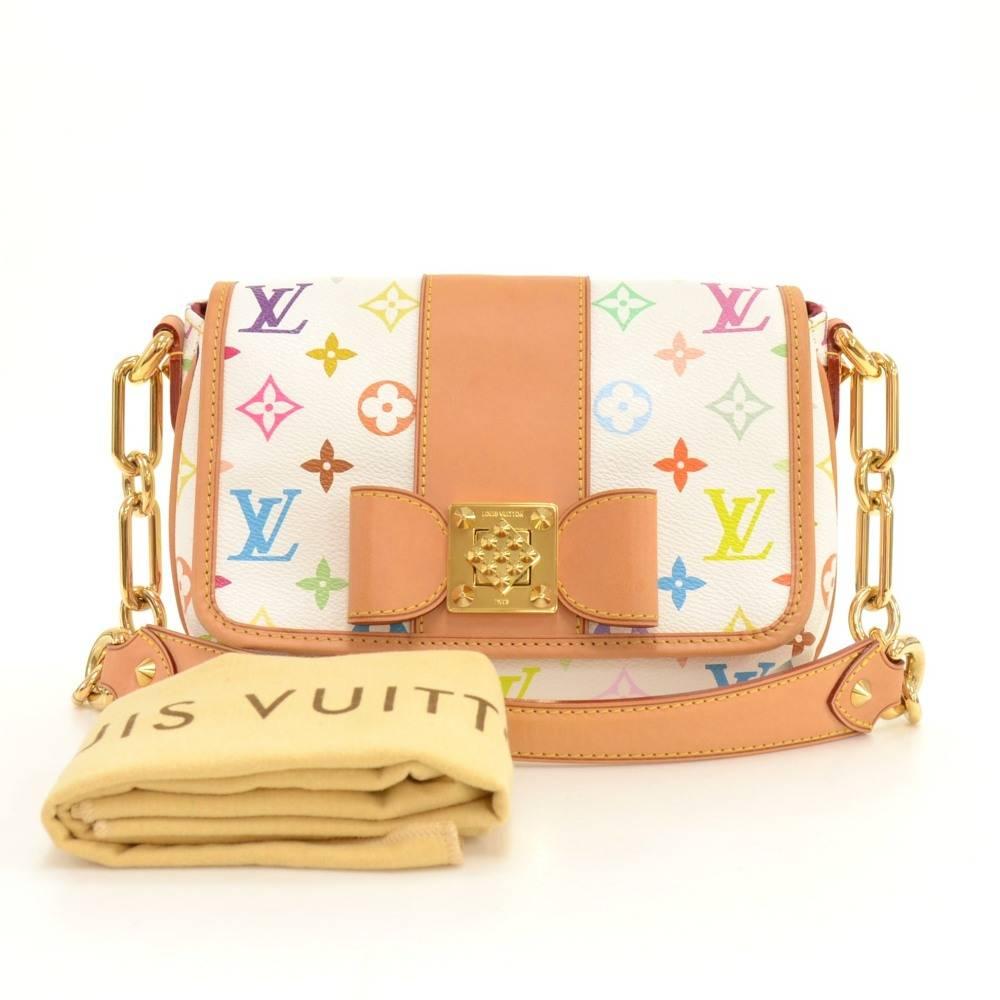 Louis Vuitton Paatty hand bag in White multicolor monogram canvas. Flap top with twist closure on front. Inside is in dark red alkantra lining with 1 open pocket. Very stylish item.

Made in: France
Serial Number: SR0161
Size: 8.7 x 6.3 x 4.3 inches