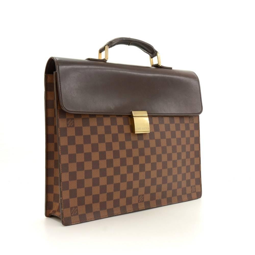 Louis Vuitton Altona PM briefcas in Damier Canvas. It has flap with lock in front and 1 open slip in pocket on the back. Inside has 1 open slip in pocket and 1 for mobile or glasses. Very stylish item which would make a great statement wherever you