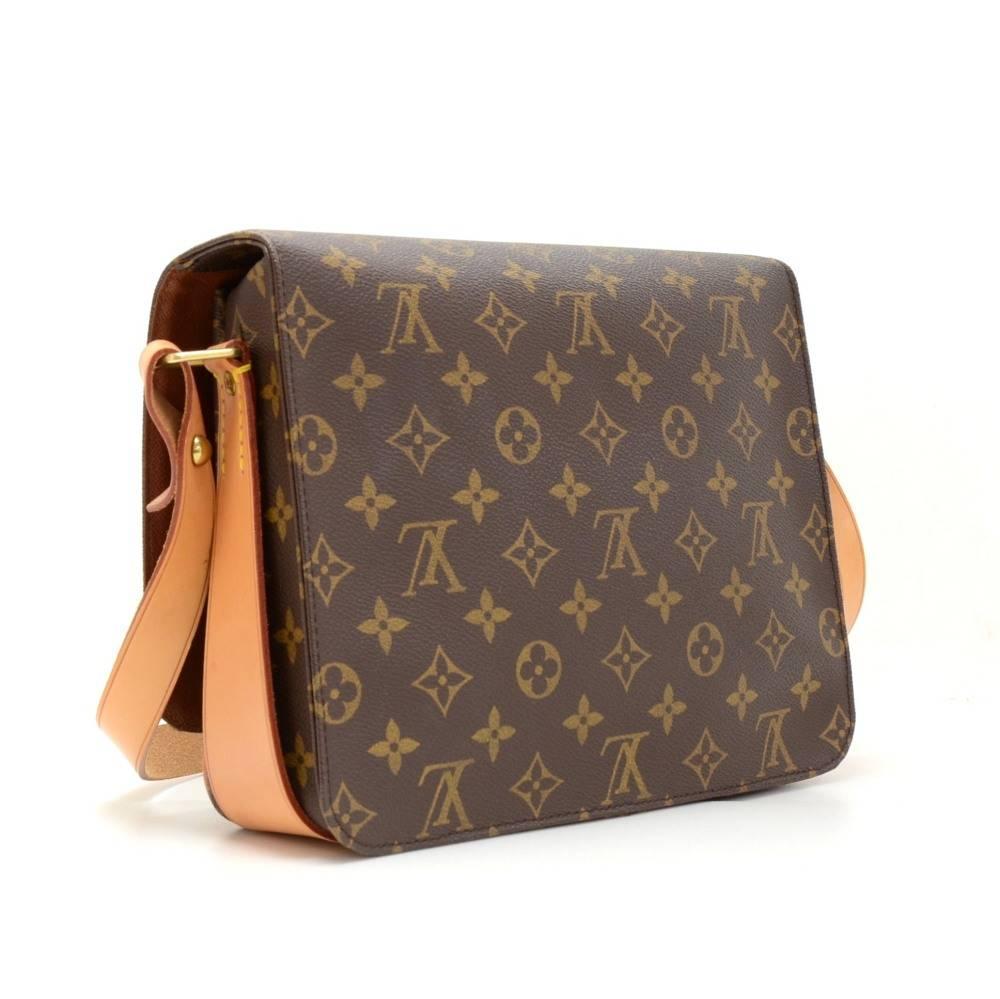 Louis Vuitton Cartouchiere GM shoulder bag in monogram canvas. Top flap is secured with a belt closure. Comfortably carry on shoulder or across body with adjustable strap. Popular item!

Made in: France
Serial Number: SL0968
Size: 9.8 x 7.9 x 3.1