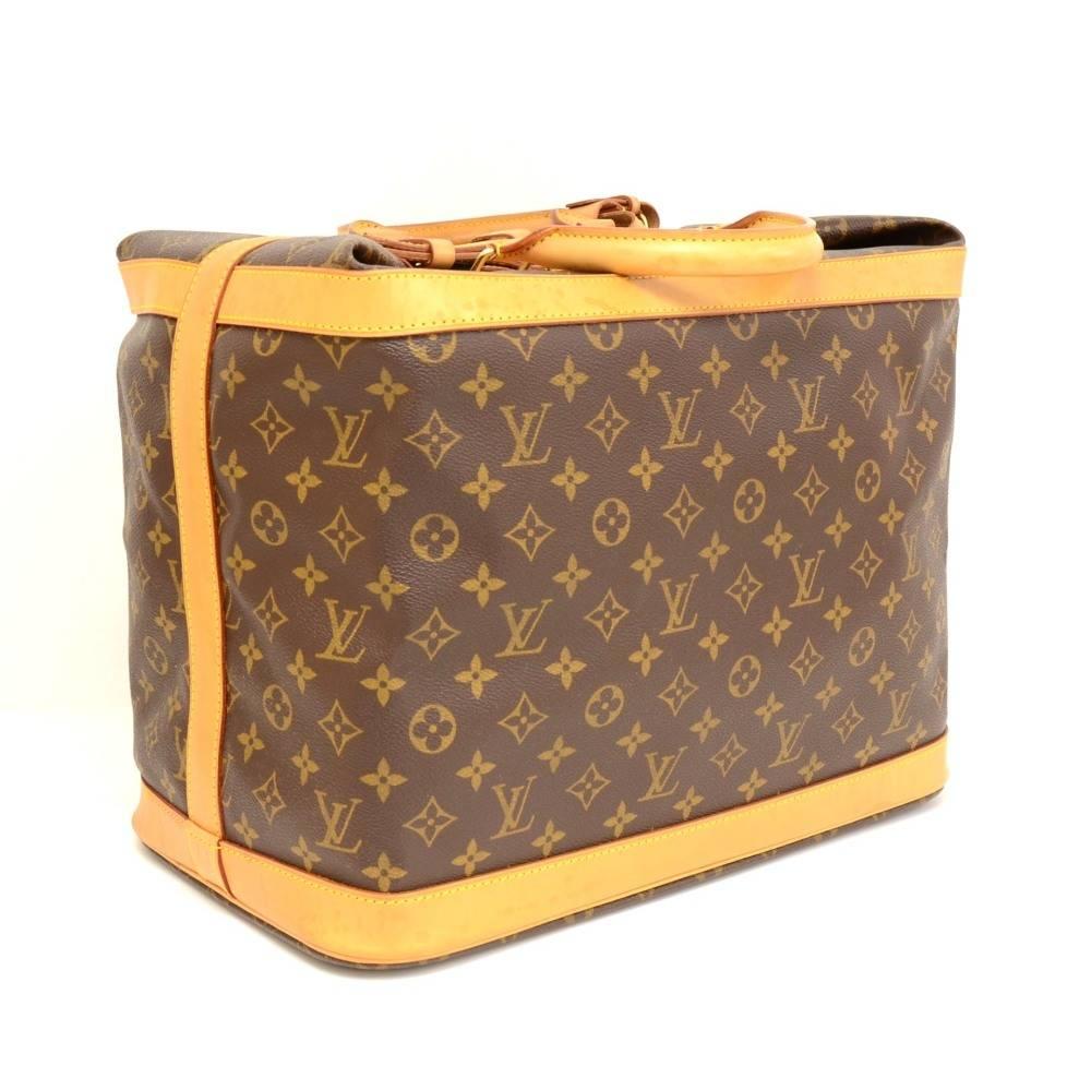 Louis Vuitton Cruiser bag 40. Easy access with double zipper secured with a leather buckle. Inside has 1 open pocket. 5 studs on the bottom of the bag for protection. Perfect size to keep you organized wherever you go. Comes with name tag and