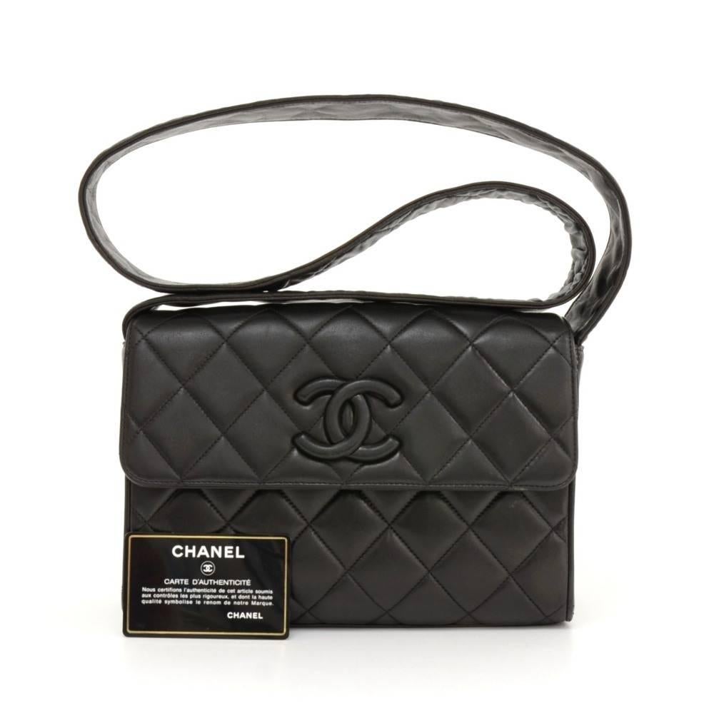 Chanel shoulder bag in black quilted leather. It has one pocket on the back and flap with CC logo magnetic closure on the front. Inside has famous Chanel red leather lining with 2 side pockets: 1 open and 1 with zipper. Comfortably carried on